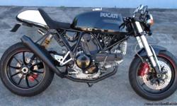 YOU ARE LOOKING AT: A USED 2008 DUCATI GT1000 TOTALLY CUSTOMIZED CAFE RACER.
&nbsp;
Fuel-Cel Fuel Tank
Retro Aluminum Gas Cap
Powder Coated Brake Calipers
4-Piston Front Brake Calipers
Custom Single-Sided Swingarm
Monster 1100 Evo Wheels
Fleda Taillight