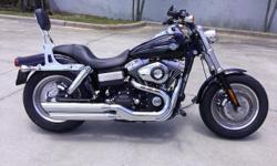 I currently have a 2008 Harley Davidson Dyna Fat Bob for sale. This bike is a one owner with 4,479 miles on it. It is a 96" 6 speed with pipes and a quick detachable backrest. The paint and chrome on this bike are both in excellent condition , the tires