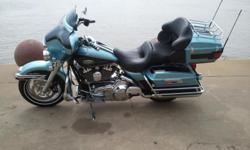 2008 Harley Davidson Ultra Classic, Suede Blue and Black, 34,000 miles, New Battery, New Starter, Blue LED lights, Security System, Lots of extra chrome, auxiliary passenger pegs,&nbsp;Upgraded speakers and amp.