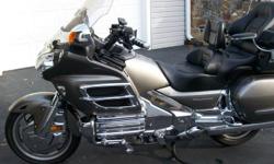 The bike is like new condition. 22k miles. Titanium color with many accessories. Garage kept and adult driven.Trailer Hitch, passenger arm rests with cup holder, Utopia drivers back rest, luggage rack, highway pegs, chrome fairing and mirrors, fog lights,
