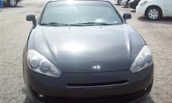 2008 Hyundai Tiburon GS. XM Satellite Radio, front bucket seats and bench back seat. Kenwood Premium brand speakers, CD player, front fog lights, 4-Wheel ABS 5 speed. Cloth interior. This is a great car.&nbsp;
&nbsp;
If you have any questions or would