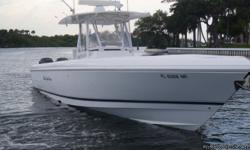 This is a very low hour, well maintained boat. It is loaded with all the factory options such as: Factory white powder coated T-Top, Side dive door, Bow thruster, Windlass, Walk-in head inside the console, forward removable table, recling lounge seating