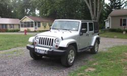 2008 4 Door Jeep Wrangler Sahara Unlimited with Removable Hardtop. Great pleasure vehicle . Has 60,000 miles runs Great. Owner in military and is leaving for Deployment. Must sell. Call John for apt to see .