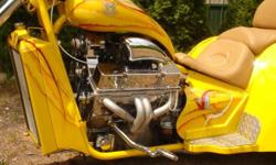 V8 Chopper Trike. This bike has been well cared for. Bought for my wife. Low miles and great shape. Has LED lighting underneath and around motor, they blink fast,slow and change colors. 520 hp with a Dart 400 CI engine chromed out. Has Nitros tank for