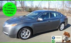 (There are no flaws on this vehicle it is just reflections.) This TL is AMAZING. It comes equipped with NAVIGATION, BACKUP CAMERA, BLACK LEATHER INTERIOR, DUAL POWER MEMORY HEATED SEATS, POWER SUNROOF, XM RADIO, 6 CD CHANGER, TRACTION CONTROL, DUAL