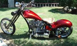 2009 custom chopper, 120 ci , aprox. 1900 cc. Ultima El Bruto motor with 5926mi, Ultima 4? open primary with 6
speed tranny, 45 HSR Mikuni carb.&nbsp; Springer front end, Harley hand controls, Dakota digital dash, candy red paint,
solo seat & removable