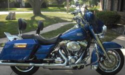 This is one sharp bike, blue in color&nbsp;with over $15,000 in chrome and extras, detachable trunk, LED lights and only 10,000 miles&nbsp; call --