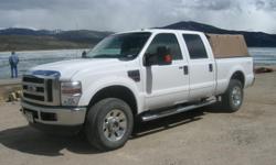 Ford F250 Truck is in showroom condition, loaded, sprayed truck bed, leather seats, 4 door super duty crew cab. Power everything. Only 20,000 miles, soft topper is negotiable. Call Gary 970-409-8315