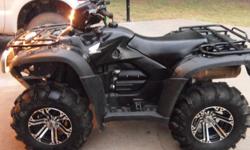 2009 Honda Foreman Rubicon 4X4, excellent condition, 112 hours, 468 miles, garage kept, very well taking care of, $6400.00 or best offer, it cost me $8600.00 to have it set up like it is, black on black with custom tires and rims, ITP mud lites with SS