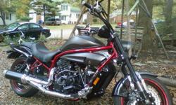 Custom paint and exhaust, cruiser mirrors, less than 2000 miles. Looking to sell, make an offer. Remaining warranty. Great buy, must see. Why wait til spring? Great looking bike like none most people have seen. Why spend 10,000.