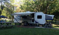 2009 Jayco Jay Feather 23 B expandable. 24 Foot two fold out bunks one on each end both queen size, fiberglass siding, slide out with couch, sleeps 8, 12 foot awning only 2 years old, four stabilizer jacks, spare tire, two 20 LB propane tanks, electric