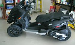 PIAGGIO (&nbsp;FOR&nbsp;BIG BOYS AND GIRLS&nbsp;SCOOTER). 500CC.&nbsp; FAST (90+ MPH) AUTOMATIC 57 MPG ON GAS.&nbsp; SMOOTH RIDE. ELECTRONIC SEAT. ANTI-THEFT DEVISE. NEW CYCLE COVER (ALWAYS GARAGED AND COVERED) + NEW HELMET 7,800 MILES ON IT. GREAT BIKE.