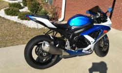 2009 Suzuki GSX-R in great condition. It has never been laid down and has 1,823 miles on it. It runs and rides great and has a clean title.
The motorcycle looks great but it does have some minor garage rash along with normal signs of wear.
This motorcycle