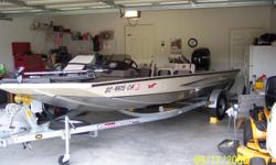 2009 Triton Aluminum Bass Boat.17'10" long, 95"beam. 60HP Mercury 4 stroke. 45lb thrust Motor Guide Trolling motor, foot operated. Two Lowrance Fish Finders, Lowrance GPS with card. Live well and mega storage.Galvanized Trailer with spare tire. Less than