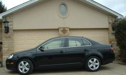 This 2009 Volkswagen Jetta 4 Door SE car has low highway miles (34,291 miles), garage kept, dealer maintained, diamond coated and is still under FACTORY Warranty. This car has been pampered and has been a non smoking car.
The features are as follows: