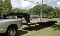 2 10,000lb axles, Dove-Tail, 6 Straps, 2 Chains with binders, front mounted tool box Call (225)313-9758