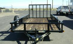 2010 Big Tex 70PI-18
This trailer is 18ft long with a 4ft tall rear ramp gate, the GVWR is 7,000 lbs and the axles are 3,500 lbs. Other features include: breakaway kit, E-Z lube hubs, sand pad, stake pockets, swivel trailer jack, brakes (1 axle), spare