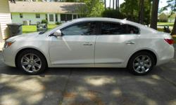 2010 Buick Lacrosse CXL, One owner,&nbsp;58,500 miles, shaded window vents, cool ray tented windows, rear power shade on back window, Bucket seats, center counsel automatic shifter,wrap around wood grain accents on dash and doors, daul climate controls,