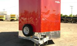 Wells Cargo MT2022-1000 V Front
This trailer is 102" in width and 20' in length with a GVWR of 7,000 lbs and 3,500 lb axles. Other features include: corrosion preventive compound (CPC), dome light, ramp door extension, spare tire & wheel, 15 inch tires,
