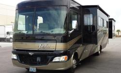 This Fleetwood motor coach is the perfect FAMILY RV with the ability to sleep 8 people. It has a Ford Workhorse chaise with a Chevy 455 8.1L Vortec V8 engine. It includes 2 bunk beds with individual DVD players, a convertible couch and dining area and