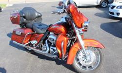 The Holy Grail of CVO, Ultras?the 2010 in Burnt Ember!!! This delicately enjoyed, PERFECTLY appointed CVO Screamin? Eagle Electra Glide Ultra Classic features Burnt Ember over Hot Citrus Pearl Metallic with Hand Laid Flames, Screamin? Eagle Exhaust,
