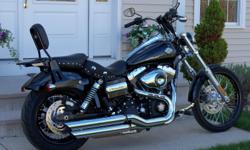 2010 Harley Davidson Wide Glide (Vivid Black & Chrome). This bike is in mint condition. It is rarely used and only has 2700 miles. It comes with full warranty and is good through July 2012. The bike has many extras including: factory security, Mustang