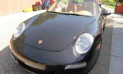 This Porche 911 has the following: self dimming mirrors, heated seats, 19" sport wheels, comfort seat L electric, comfort seat R electric, Wheel caps colored crest, L seat w/position % lumbar, DVD navigation system, mobile phone (bluetooth), sport chrono