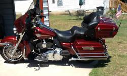 2010 Ultra Classic Harley Davidson Motorcycle; Bright Red Sunglow and Chrome; 10,400 miles; 96 cu in twin cam engine; Extended Service Plan thru 8/28/16 (transferrable); Saddle bags & Luggage rack; Rinehart pipes; AM/FM/CB radio with helmet plug-in for