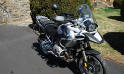 2011 BMW R1200 GS in Alpine white. comes complete with BMW Electronic Suspension, Heated Grips, Tire Pressure Monitoring , ABS, Enduro Stability Control, cross spoke wheels, Hand Guards, Tank Guards (hepco becker), engine guard (hepco becker), BMW Vario