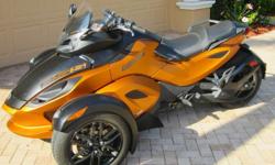 Can Am Spyder RS-S SM5 with only 1600 miles. The bike is in mint condition and comes with a free and clear State of Florida title. It starts, runs and drives great and shifts through all of the gears. The color is a very nice pearl orange with black trim.