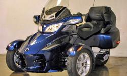 Beautiful 2011 Can Am Spyder BRP RT in Quantum Blue Metallic for Sale with only 623 miles. Nicely optioned with 5-Speed Semi-Automatic, Semi-Rigid Rear Top Cargo Bag, GPS Navigation, Tri Axis Adjustable Handlebar, Adjustable Vented Windshield, Adjustable