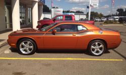 2011 Dodge Challenger 3000&nbsp;miles, excellent condition Color- Toxic Orange 6 speed Manual transmission 5.7 liter,V8 Hemi VVT engine leather interior, Keyless enter-n-go,cruise control,always&nbsp;garaged