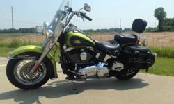 If you like to stand out from the crowd, show your individual style or just like a lot of attention then hop on this baby.
Very rare "Sour Apple" color and mint condition bike will assure that you are in the spotlight!
We are a full service Harley