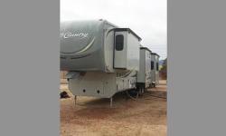 2011 Heartland Big Country 3595 5th wheel (38' overall). This is a beautiful unit loaded with anything and everything you need in a 5th wheel. The MSRP on this new, is $75,000. Some of the features included in this are as followed: 4 slide outs with