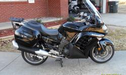2011 Kawasaki Concours 1400 ABS. The all new KTRC & K-ACT traction & braking system.
2955 miles
Warranty that follows the bike thru 7-18-15 (extended warranty available thru Kawasaki).
Factory heated grips
Givi trunk mount with brake light wiring harness