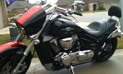2011 M109R LE. Black with dark orange stripe. It currently has 3739 miles on it.
Just did the oil change at 3500 miles.
Always garage kept, never been down, mature rider and never been in rain with it.
Bike is excellent condition with no scratches or