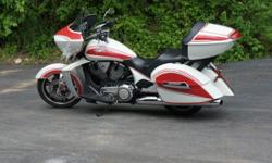 2011 Victory Cross Country
106 Motor and 6 Speed Transmission
The Stage 1 Upgrade Gives a Nicer Sound Than Stock
Nice Matching Front and Rear Wheels with Tires with Plenty of Tread
Pearl White with Candy Red Stripes -Looks Sharp
Full Stereo System with