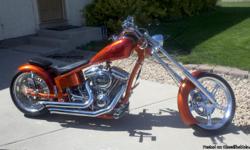 2012 American Motorcycle Company Chopper. 200 original miles, 110 Rev Tech motor, 6 speed, 250 rear tire, excellent condition. Orange/red flames. Call Nick --.