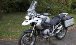 &nbsp;Here, for sale, is my nearly new 2012 BMW R1200gs. It has only 850 miles on it and it doesn't have a scratch on it. I broke my wrist on my dirt bike 3 weeks after purchasing this bike. It's been stored in my climate controlled garage with exception