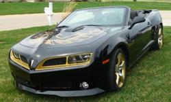 2012 TRANS AM CONVERSION. STARTED AS A 2012 2SS CAMARO CONVERTIBLE. PROFESSIONALLY CONVERTED TO A TRANS AM. BLACK WITH BLACK LEATHER INTERIOR. 6.2L V8. AUTOMATIC TRANSMISSION WITH PADDLE SHIFT. THE MOTOR IS COMPLETELY STOCK. 2700 MILES. HAS THE CONSOLE