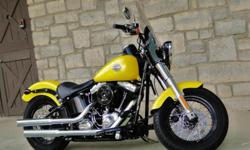2012 Harley-Davidson Softail Slim FLS. The Softail Slim is the "perfect blend of classic, raw bobber style and contemporary power, creating a modern ride with unmistakable old-iron attitude". STUNNING custom Softail Slim with only 225 actual miles! You