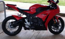 2012 Honda CBR1000RR has 1100 miles on it. I am the first owner and have taken great care of it. this motorcycle has 0 issues.
It has some extras with it
voodoo slip on exhaust, hot bodies rear tire hugger, puig windscreen. fender eliminator kit,