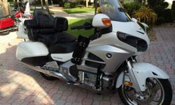 2012 Honda Goldwing. Has ABS and Airbag, side air deflectors, ride off center stand, rear LED lights, LED driving lights. Bike is in immaculate condition. Bike has had all service performed at dealer and have all receipts . Navigation has current update