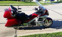 2012 Honda Gold Wing with Comfort System&nbsp; Premium Audio with XM radio and built-in Navigation System, but no ABS.It has a 7 year extended warranty set to expire in May 2019.The&nbsp; bike includes, Hondaline LED driving lights and chrome front brake
