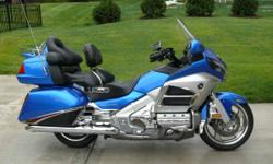 &nbsp;
2012 Honda Gold Wing, Beautiful blue/silver. Lots of extra chrome (see photos) GL 1800. 6 Cylinder. AM/FM Radio. USB plug in the trunk for iPod/IPhone or a flashdrive (music) Includes add on ZUMO navigation system.
Butler cup holder and cup. Floor