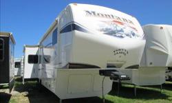 2012 Montana fifth wheel, model 3700RL. 3 slides Hickory Edition Made For Full Time Living. Tons of Storage, Only Towed 400 Total Miles. Like New, No Smoking, No Pets INTERIOR FEATURES: Vinyl Floors, Carpet, Corian Counter Tops, Full Kitchen, 4 Door