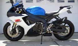 This bike is in showroom condition there is not a mark on it!
It has a yoshimura R-77 end can with maybe 300 miles on it I also have the stock can with the sale of this bike.
It also have a yoshimura plate holder/fender I also still have the original that