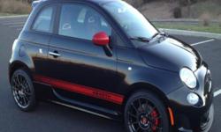 2013 Fiat 500 Abarth in showroom new condition with only 1690 miles and very well taken care of. This Abarth has been garage kept and undercover since the day it was brought home and only driven on weekends. This car is extremely fun to drive!! An
