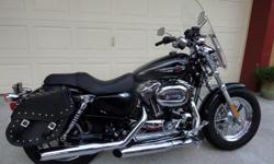 Original owner, 9 months old and still under warranty. It's in A+ condition with only 1,433 miles. Always garage kept and hardly ridden as we also own another Harley. Bike has $1,200 in Extras including a Security System, Garage Door Opener, detachable