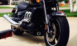 2013 Triumph Rocket 3 Roadster. It has performed very well and I have cared for it exceptionally well. As you can see in the pictures I keep it very clean.
As the ad indicates, the bike is in 100% stock condition. The chromed left side tank cover, known